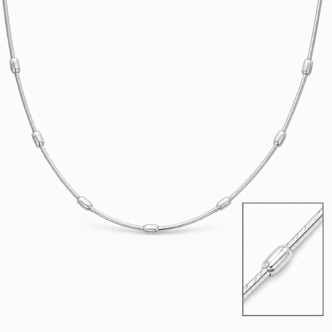 Silver snake chain necklace with oval bead accents